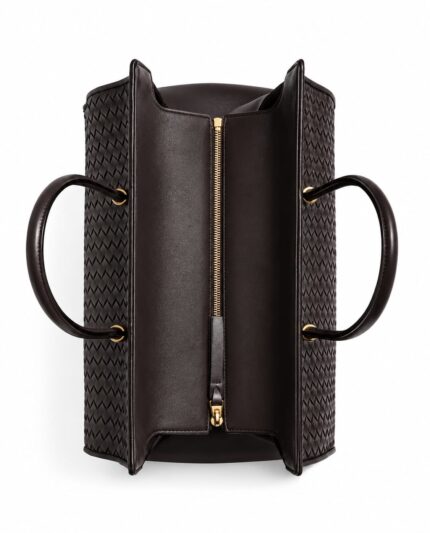 Top view of the York & Cali woven leather tote bag showing the interior zip pocket and gold zipper